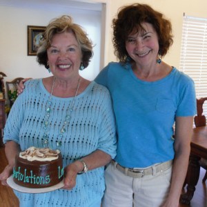 Deb Gaal presents Lou a launch cake Mail-Order Mate crop 7-2012